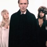 Christopher Lee is surrounded by beauties in Dracula AD 1972